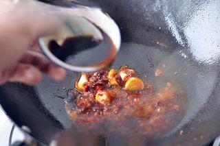 Mapo Tofu with Peanuts step 13: Add the ginger and green onions, stir-fry until fragrant.