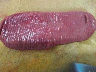 Pork Kidney Stir-Fry step 6: Continue cutting until you reach the edge without slicing through.