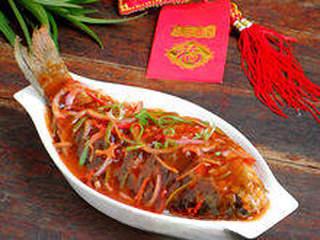 Recipe step 16: Pour the sauce over the fish while it's still hot and serve immediately. Enjoy t