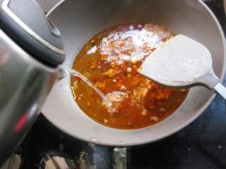 Steamed Tofu with Minced Pork step 11: Pour in one bowl of water and bring to a boil.