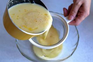 Milk Pudding with Caramel Sauce step 3: Strain the pudding mixture through a sieve.